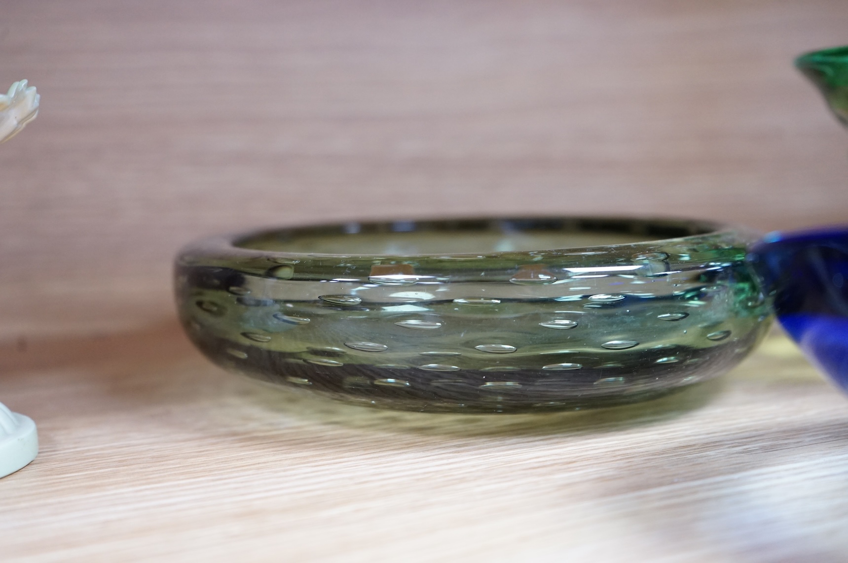 A Whitefriars green glass ‘bubble’ dish, a Costa Boda blue/green bowl and a Murano dish (3) tallest 10.5cm